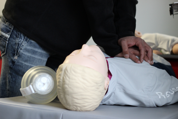 Individual performing CPR